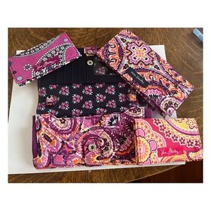 Set of various Vera Bradley wallets and credit card holders. Various patterns.